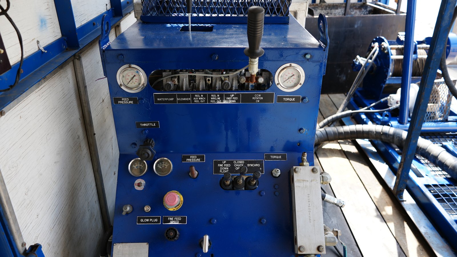 Discovery II operator control panel with labelled hydraulic controls and pressure gauges.