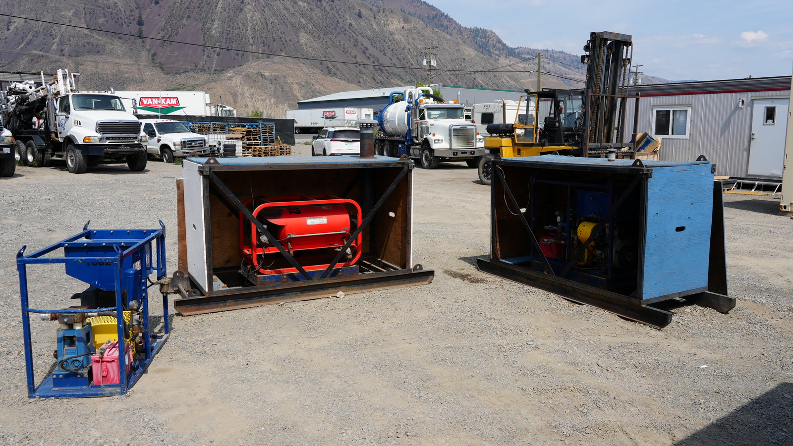 Support equipment photographed with the Discovery II package, including pumps, heaters and enclosures.