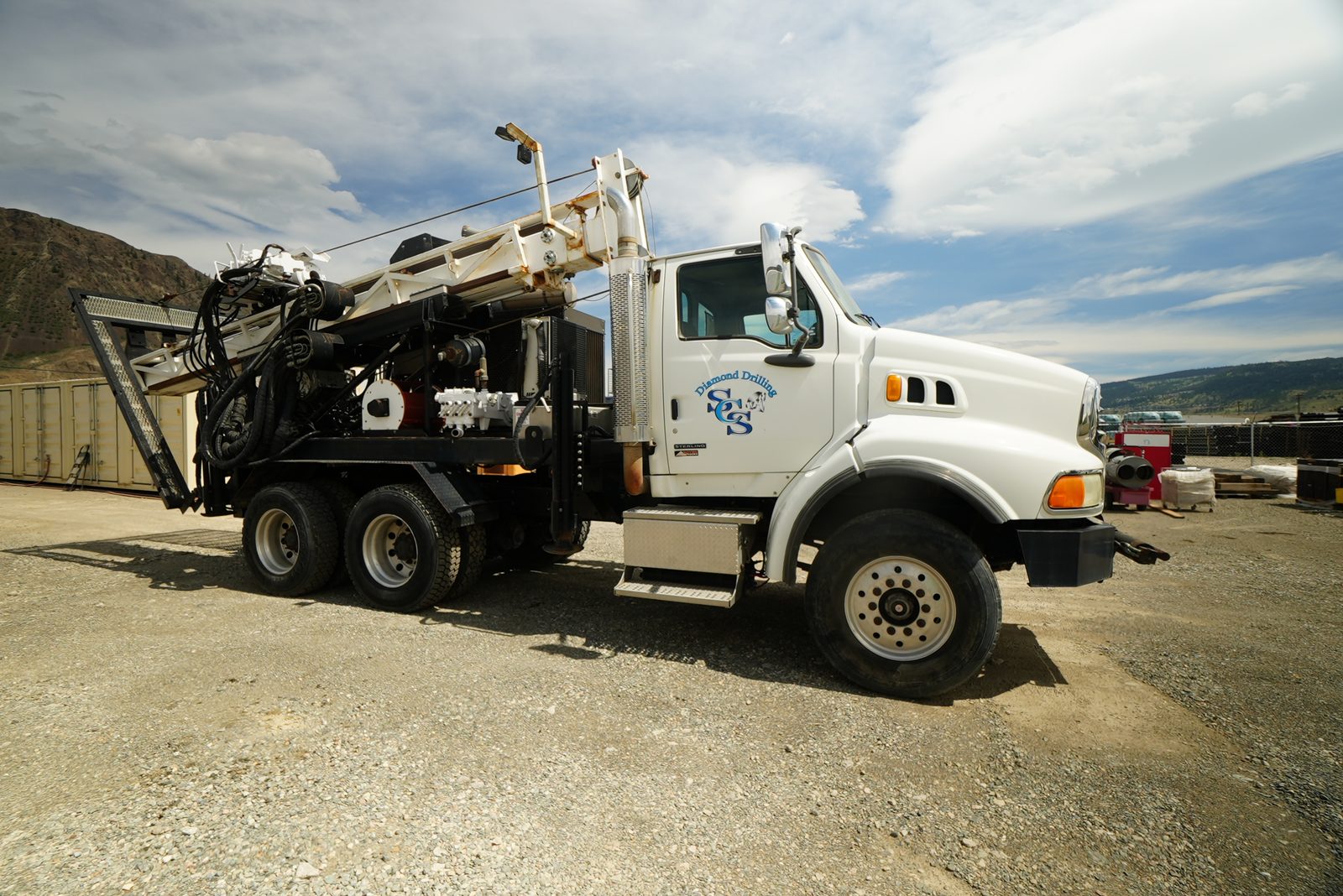 Full front-quarter view of sold LF90D Drill Unit 101 on its Sterling carrier.